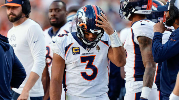 Russell Wilson head down vs Commanders Isaiah J. Downing-USA TODAY Sports